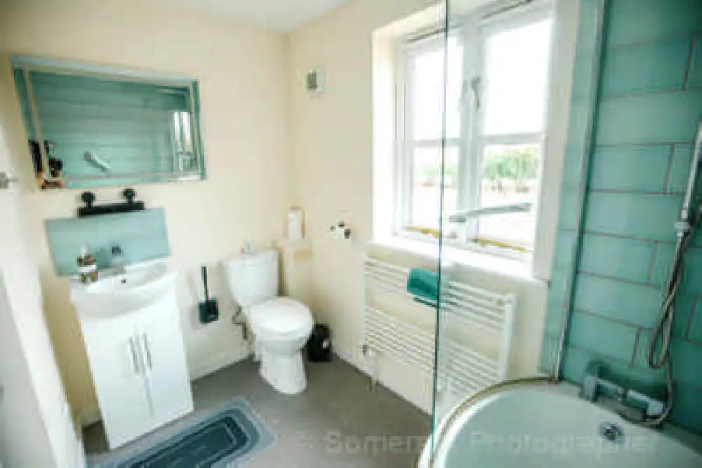 Upstairs Bathroom with Shower Facilities