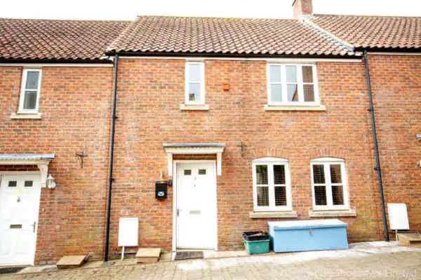 Front Exterior of the House - Central View from Street